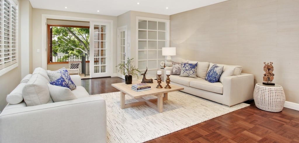 Bright neutral living room project associated with GMK Interior Design